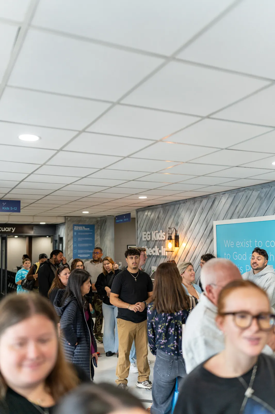 The lobby fills with guests as the crowd arrives.